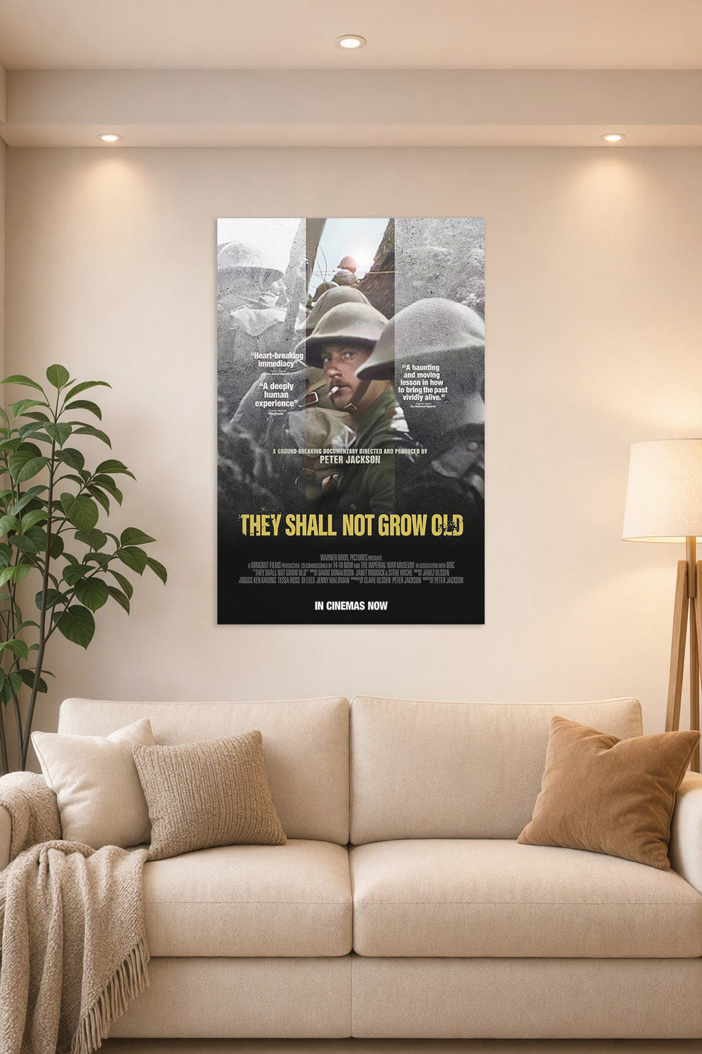 They Shall Not Grow Old Movie Poster in a bright living room above a beige sofa.
