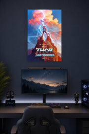 Thor Love and Thunder in a gaming desk setup above a monitor.