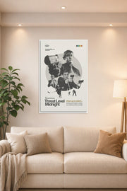 Threat Level Midnight Movie Poster in a bright living room above a beige sofa.