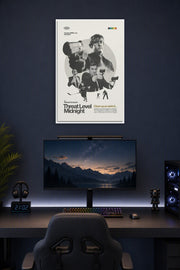 Threat Level Midnight Movie Poster in a gaming desk setup above a monitor.