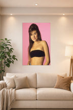 Tiffani Thiessen in a bright living room above a beige sofa.