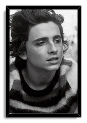 Timothée Chalamet framed wall art print displays a black-and-white portrait in a sleek black rectangular frame.
