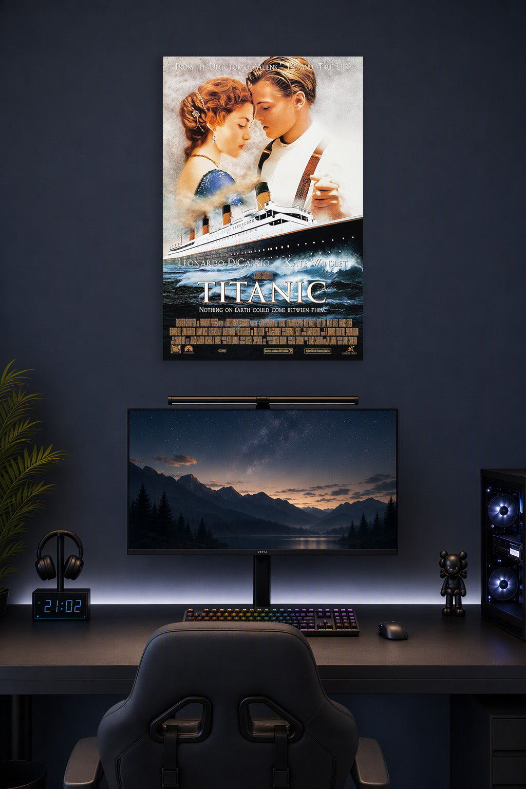 Titanic Movie Poster Jack and Rose in a gaming desk setup above a monitor.