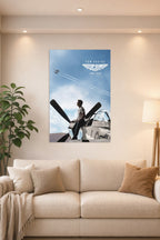 Tom Cruise Top Gun Maverick in a bright living room above a beige sofa.