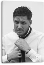 Tom Hardy canvas wall art print featuring a monochrome portrait of him tightening his tie, with wrapped canvas edges visible.