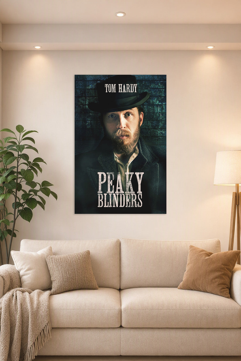 Tom Hardy Peaky Blinders in a bright living room above a beige sofa.