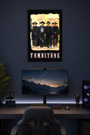 Tombstone Movie in a gaming desk setup above a monitor.