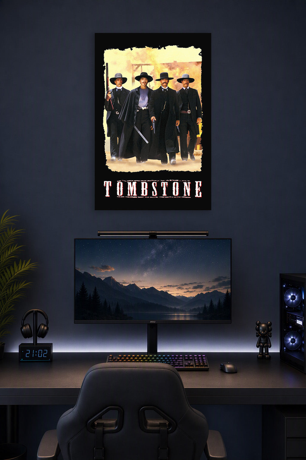Tombstone Movie in a gaming desk setup above a monitor.