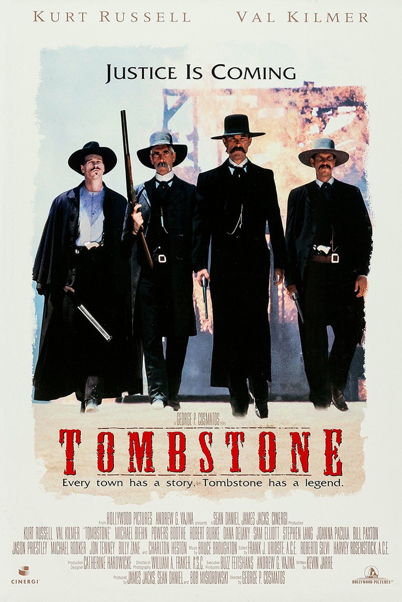 Tombstone movie poster wall art print with four armed Western men in dark coats beneath the words “Justice Is Coming.
