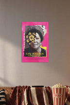 Toni Morrison in a cozy movie room above a brown sofa with popcorn.
