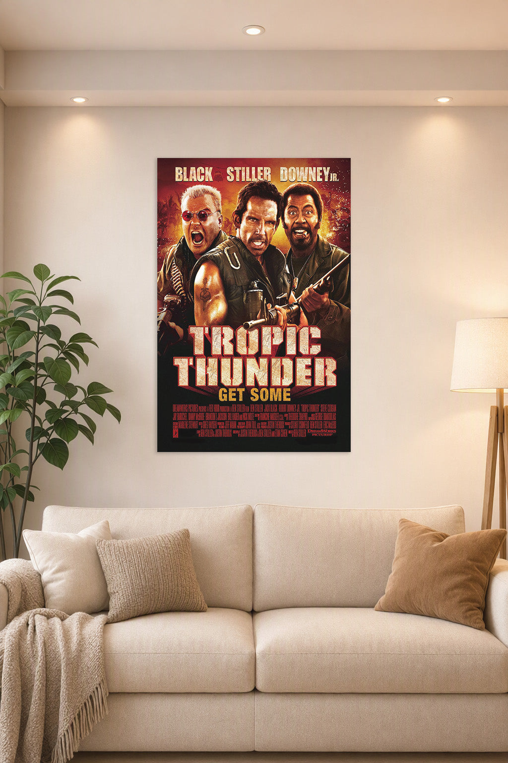 Tropic Thunder Movie Poster in a bright living room above a beige sofa.