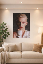 Troye Sivan in a bright living room above a beige sofa.