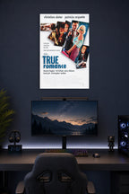 True Romance Movie Poster in a gaming desk setup above a monitor.