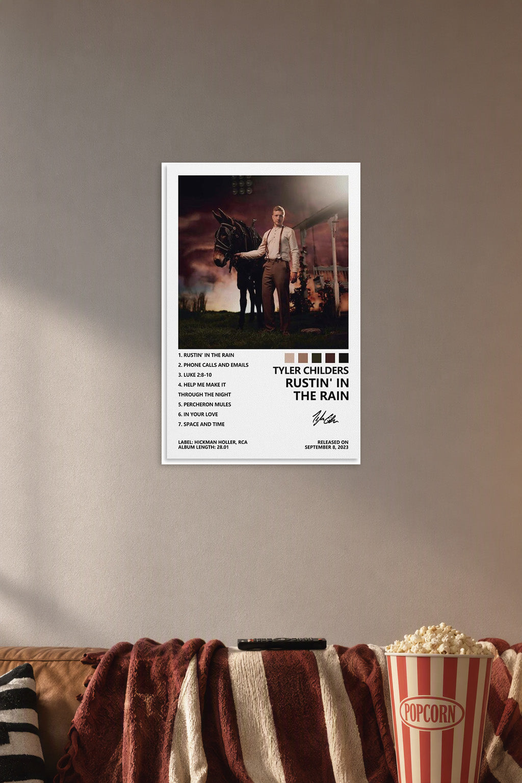 Tyler Childers Poster Rustin' in The Rain Album Cover Poster Posters in a cozy movie room above a brown sofa with popcorn.