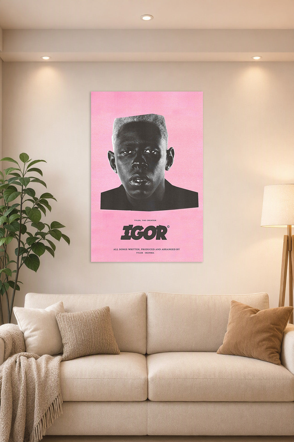 Tyler, The Creator IGOR Album Art in a bright living room above a beige sofa.