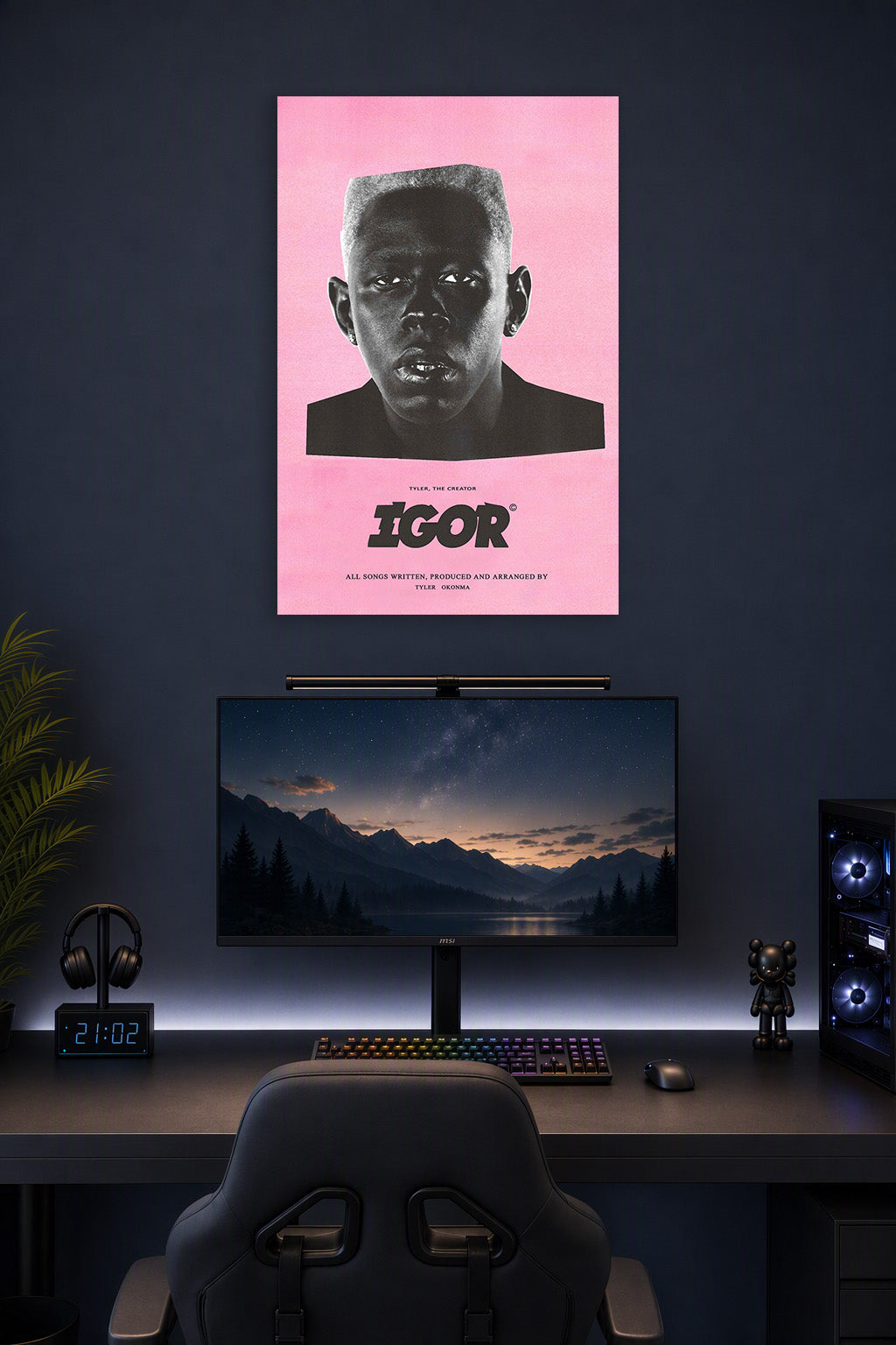Tyler, The Creator IGOR Album Art in a gaming desk setup above a monitor.