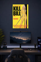 Uma Thurman Kill Bill Vol. 1 The Bride in a gaming desk setup above a monitor.