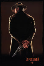 Unforgiven movie poster wall art print depicts a cowboy in a wide-brim hat concealing a revolver behind his back.