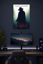 V for Vendetta in a gaming desk setup above a monitor.
