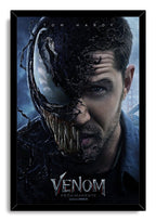 Venom framed wall art print displays Eddie Brock transforming into Venom, with black tendrils, fangs, and a glossy black frame.