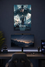 Venom Movie Tom Hardy in a gaming desk setup above a monitor.