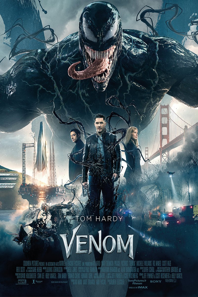 Venom movie poster features the snarling black symbiote above Tom Hardy and two figures amid San Francisco bridges and police lights.