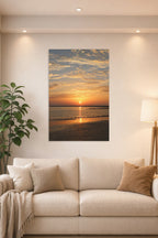 Vibrant Sunset Seascape in a bright living room above a beige sofa.