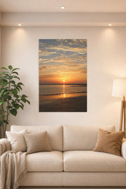 Vibrant Sunset Seascape in a bright living room above a beige sofa.