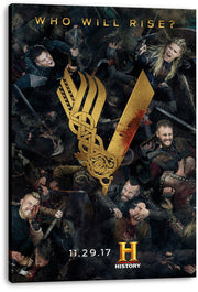 Vikings canvas wall art print displays battling warriors and a blood-marked gold V emblem, mounted on a thick black-edged canvas.