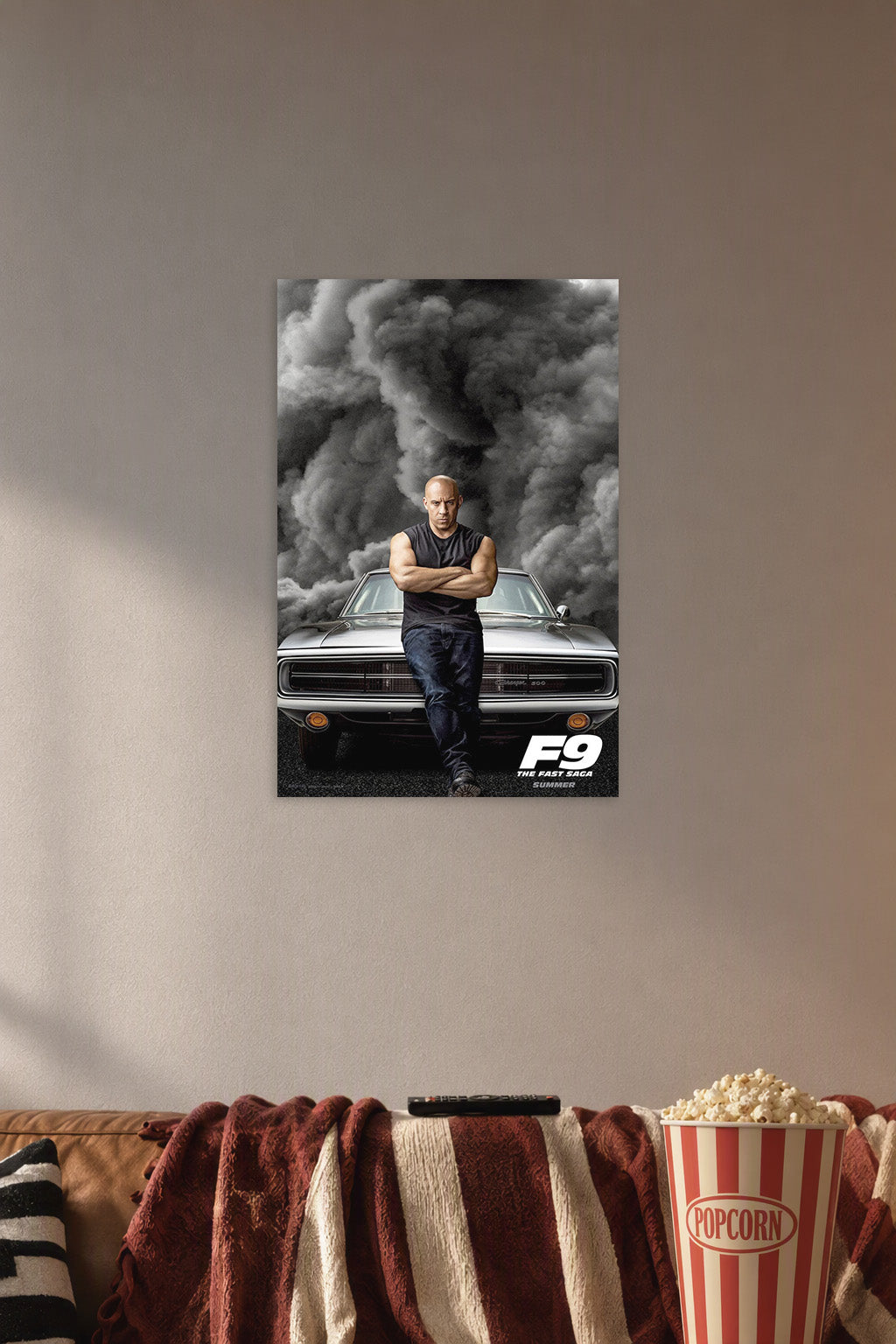 Vin Diesel Fast & Furious in a cozy movie room above a brown sofa with popcorn.
