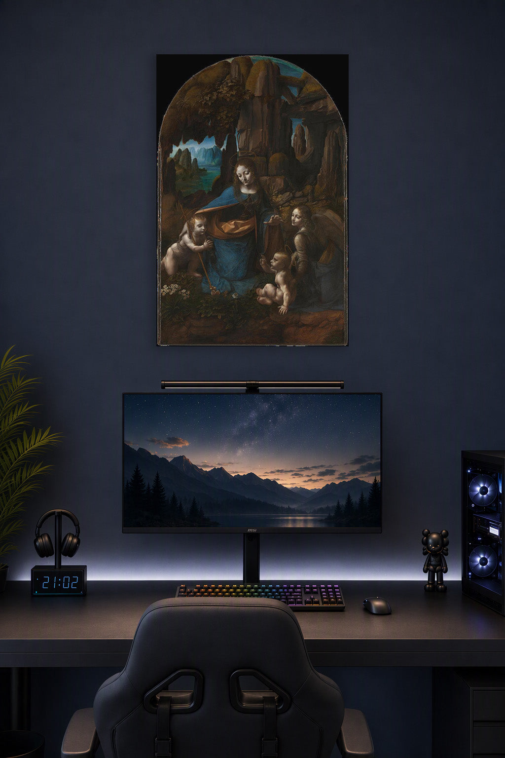 Virgin of the Rocks by Leonardo da Vinci in a gaming desk setup above a monitor.