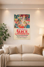Walt Disney's Alice in Wonderland Movie Poster in a bright living room above a beige sofa.