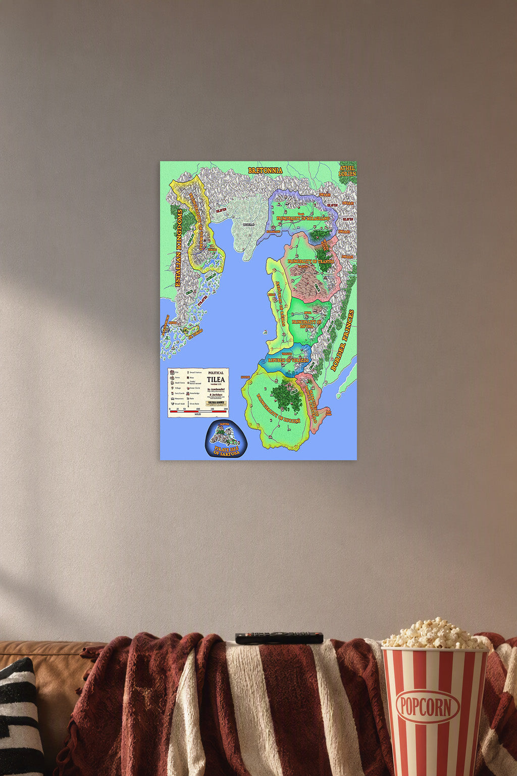 Warhammer Fantasy Political Map of Tilea in a cozy movie room above a brown sofa with popcorn.