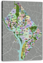 Washington D.C. neighborhood map wall art print presented on a thick canvas, with color-blocked district labels and white roads on gray.