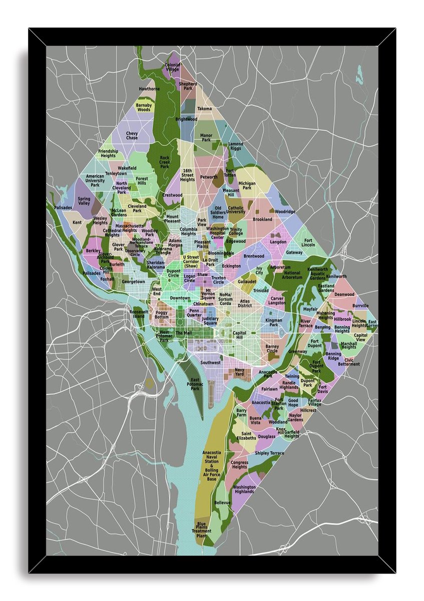 Washington D.C. neighborhood map wall art print in a black frame, featuring pastel districts, green parks, blue water, and labeled streets.