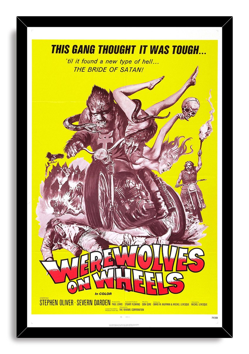 Werewolves on Wheels framed wall art print presents a werewolf on a motorcycle with a woman and skull in a black frame.