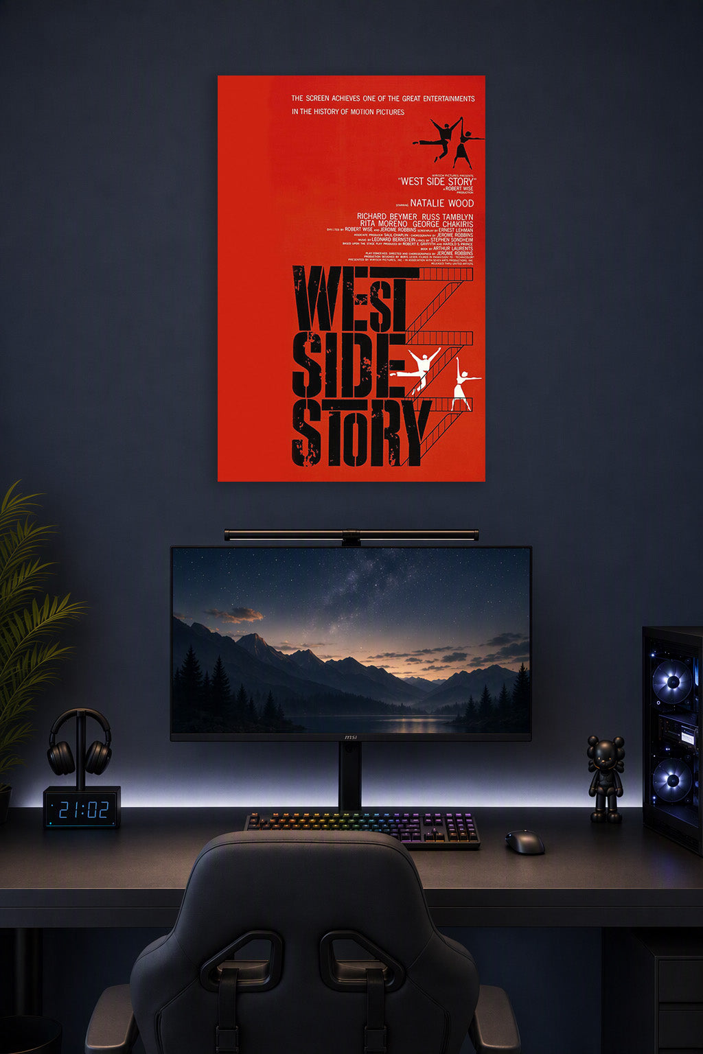 West Side Story Movie Poster in a gaming desk setup above a monitor.
