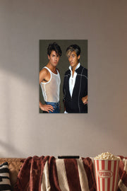 Wham! George Michael and Andrew Ridgeley in a cozy movie room above a brown sofa with popcorn.