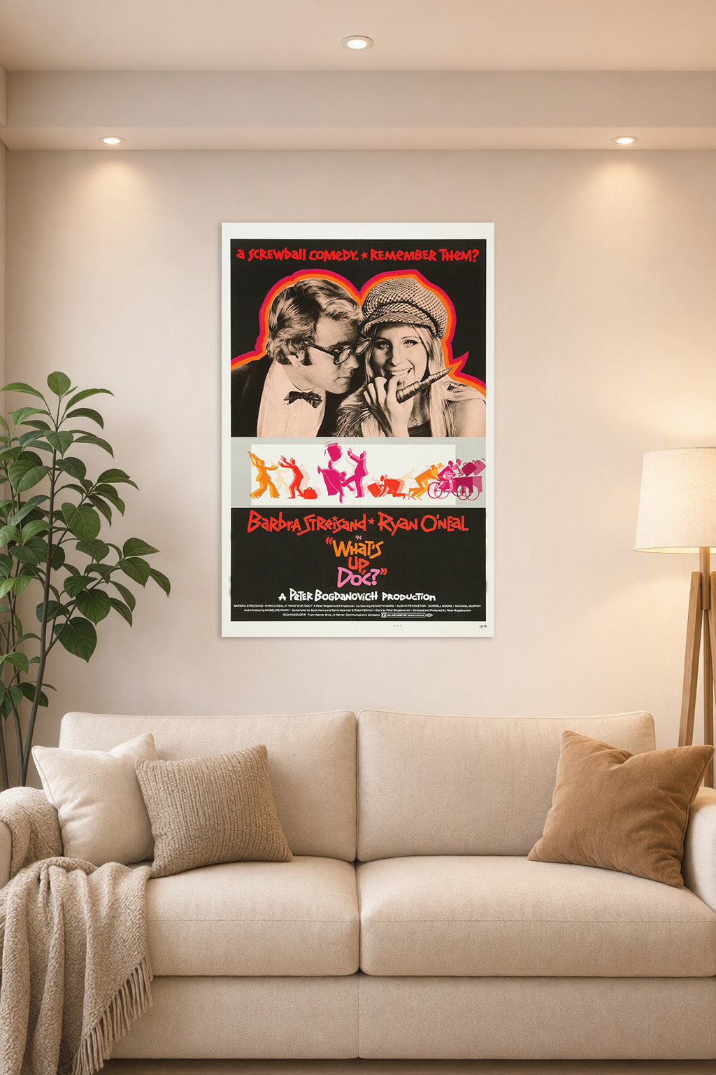 What's Up Doc? Barbra Streisand Ryan O'Neal Movie Poster in a bright living room above a beige sofa.