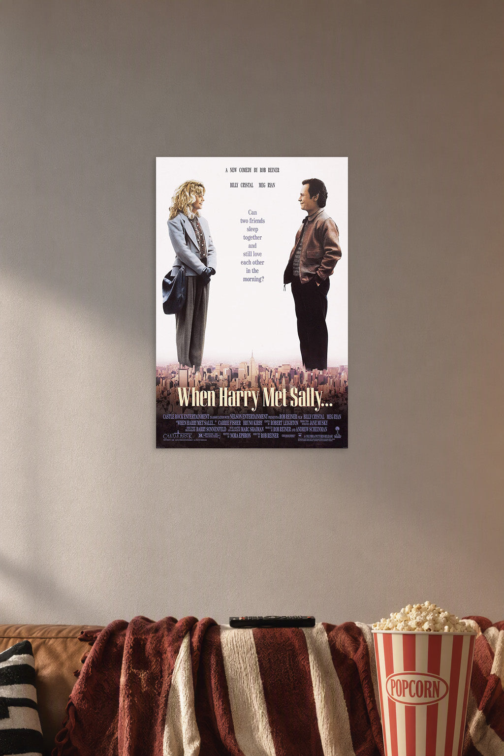 When Harry Met Sally in a cozy movie room above a brown sofa with popcorn.