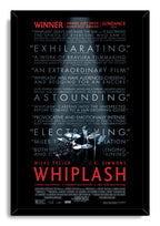 Whiplash framed wall art print presents a seated drummer beneath blue critic quotes and a large red title on black.