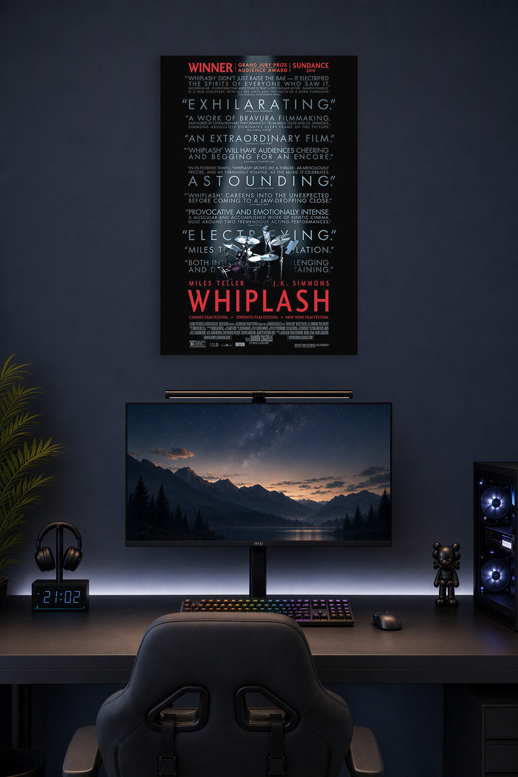 Whiplash Movie in a gaming desk setup above a monitor.