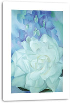 Floral canvas wall art print featuring a pale white rose and blue-violet blossoms, presented with visible wrapped edges.