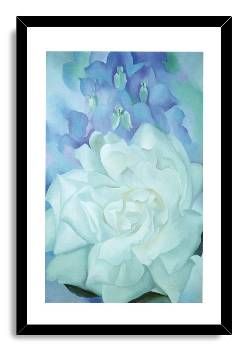 Framed floral wall art print with a black frame and white mat, featuring a pale rose beneath blue-violet blossoms.
