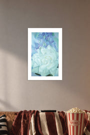 White Floral Art in a cozy movie room above a brown sofa with popcorn.