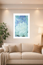 White Floral Art in a bright living room above a beige sofa.