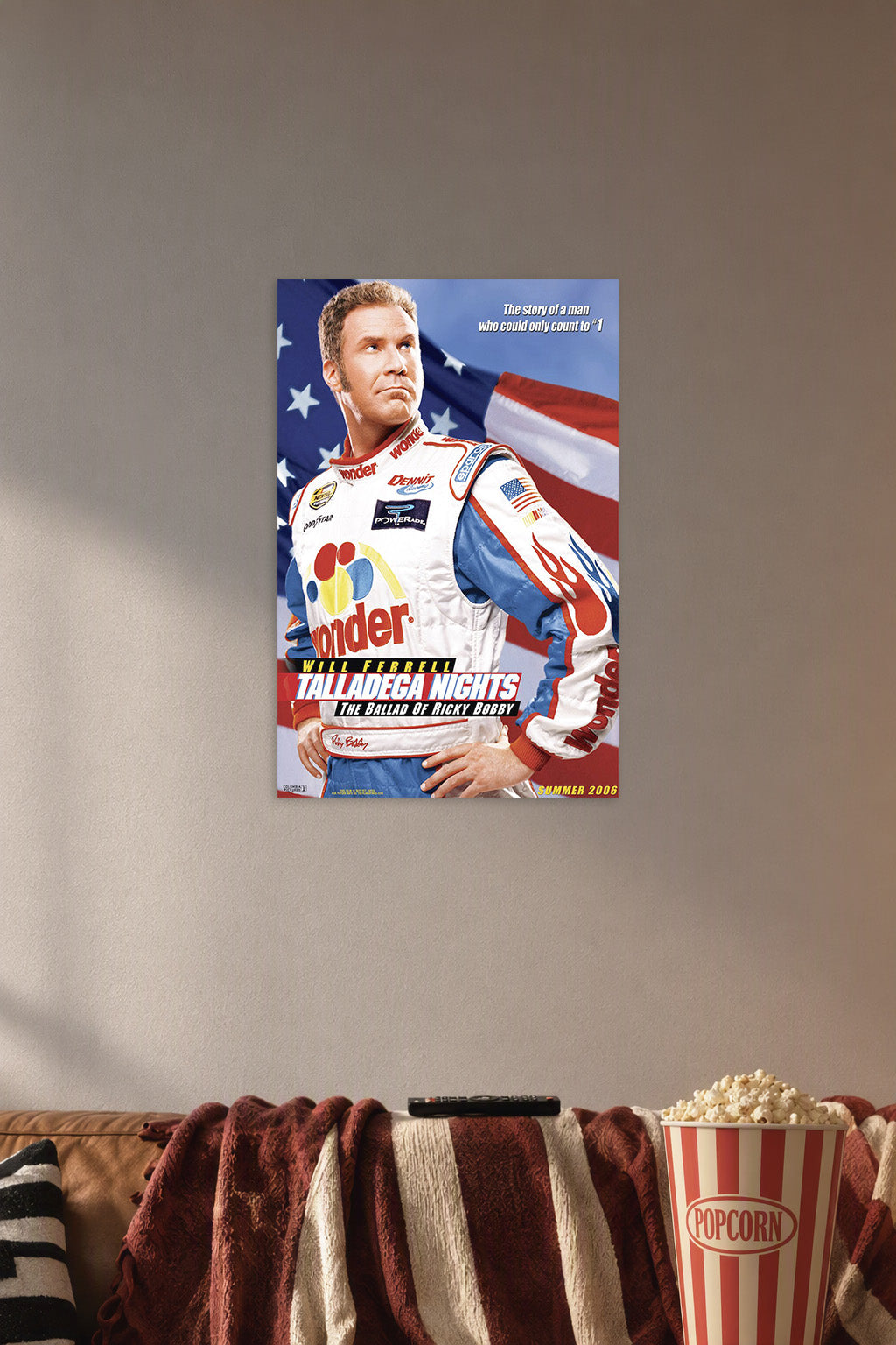 Will Ferrell Ricky Bobby Talladega Nights in a cozy movie room above a brown sofa with popcorn.