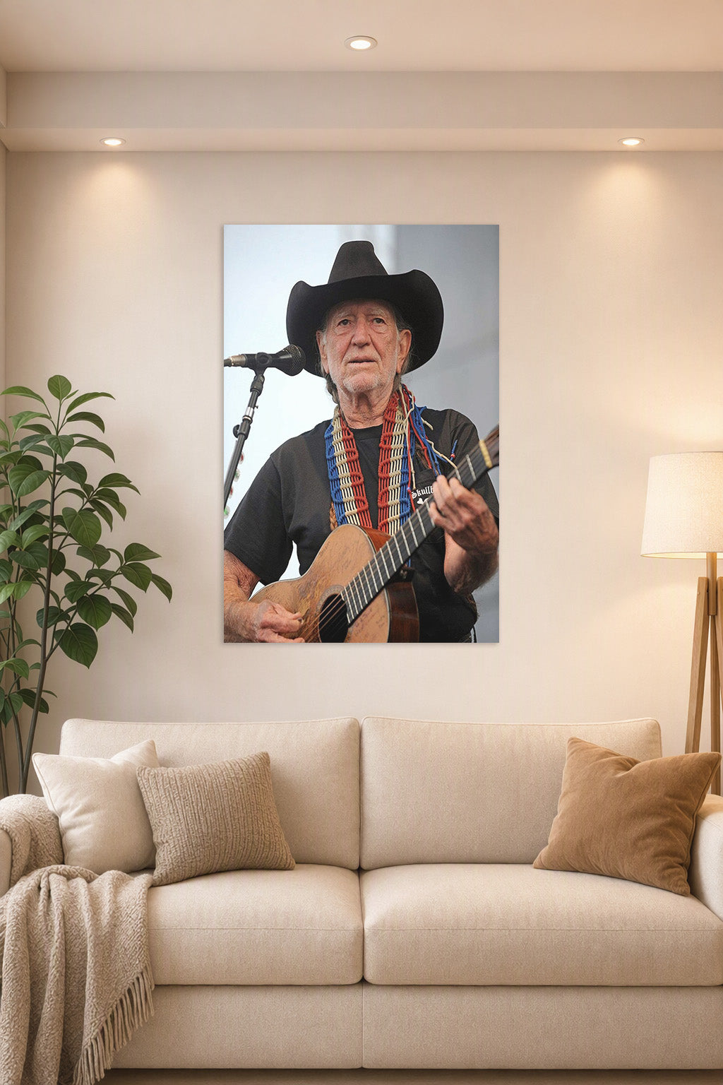 Willie Nelson in a bright living room above a beige sofa.