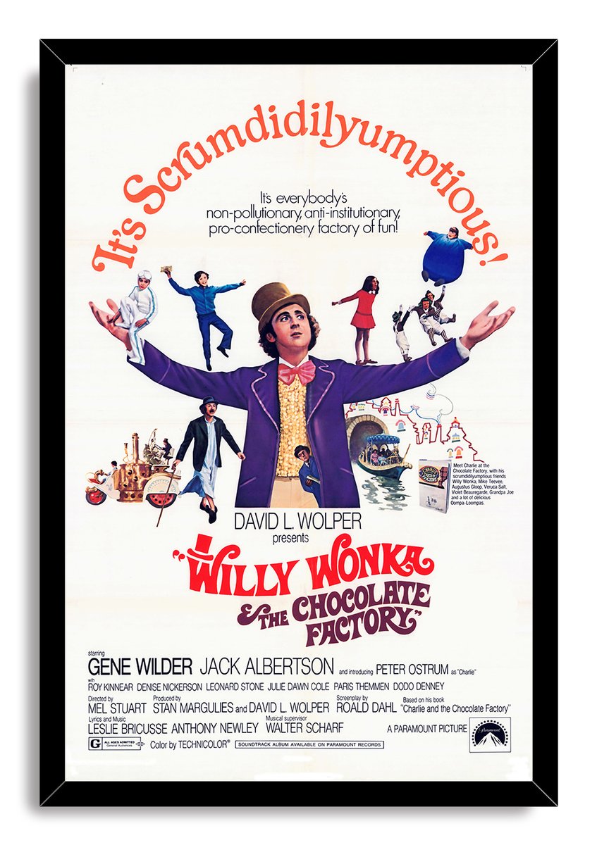 Framed Willy Wonka and the Chocolate Factory wall art print with Willy in a purple coat, red typography, children, and candy factory scenes.
