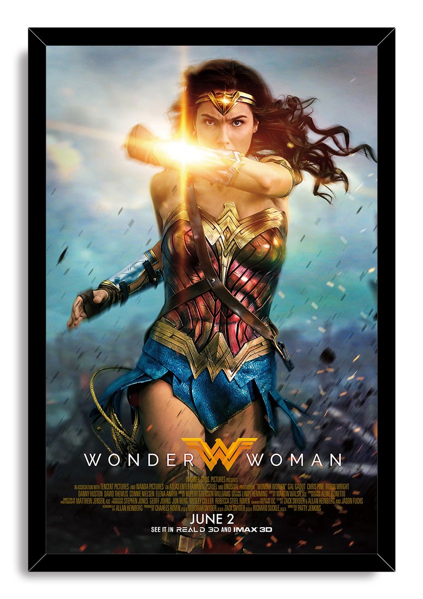 Wonder Woman framed wall art print depicts the heroine in red, gold, and blue armor blocking a bright beam against storm clouds.